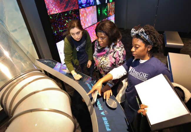 UTR students and Philadelphia youth in the VAST LIFE program during a recent trip to the Franklin Institute.