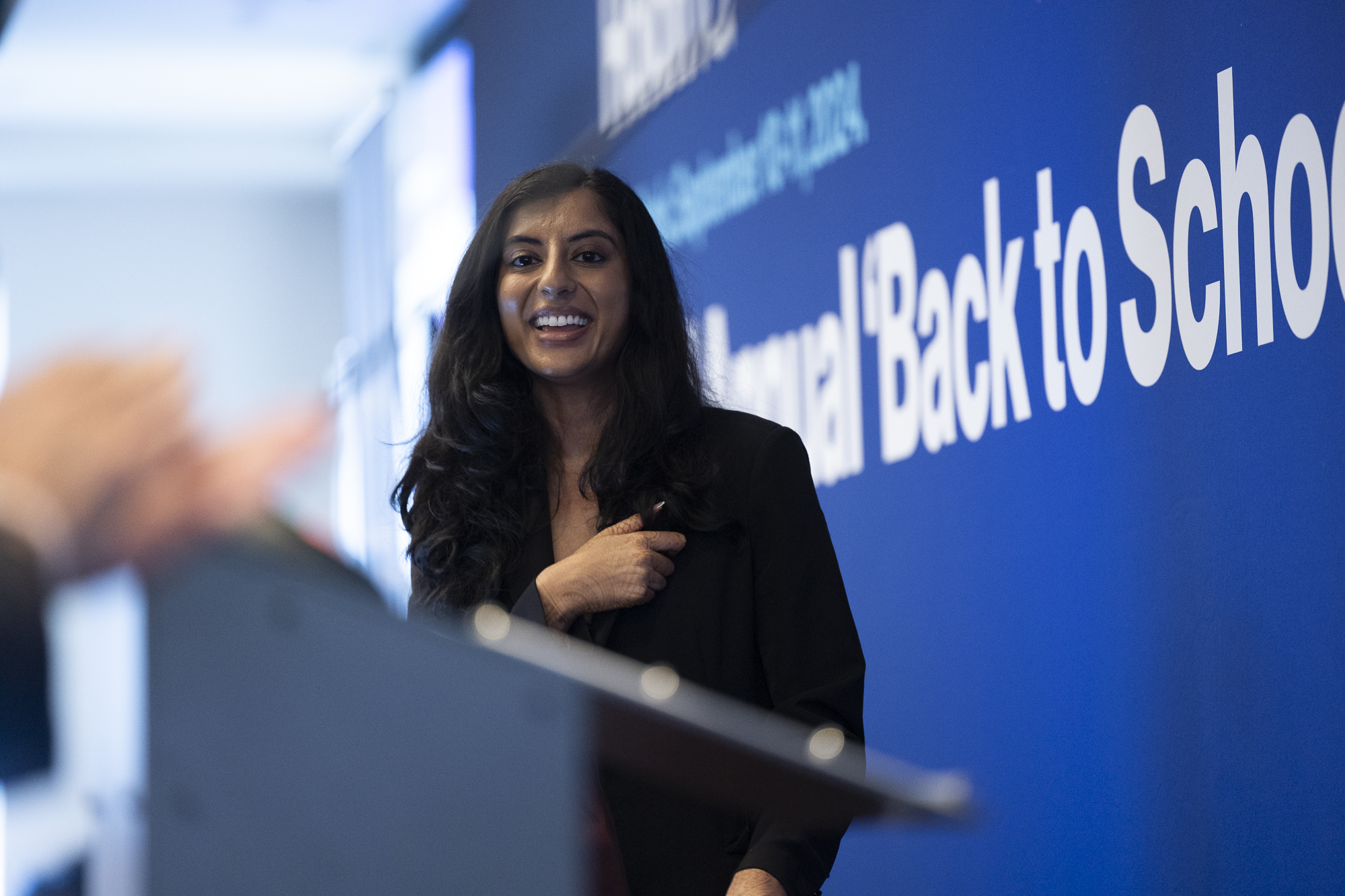 2024 Milken-Penn GSE Finalist Rina Madhani presents her final pitch on stage in New York City.