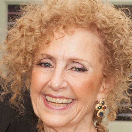 Smiling woman with curly hair